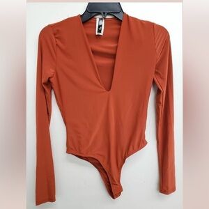 DEEP V Snap Button Lined Thong Bodysuit